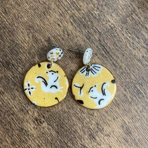 Porcelain handmade earrings with squirrels and gold accents